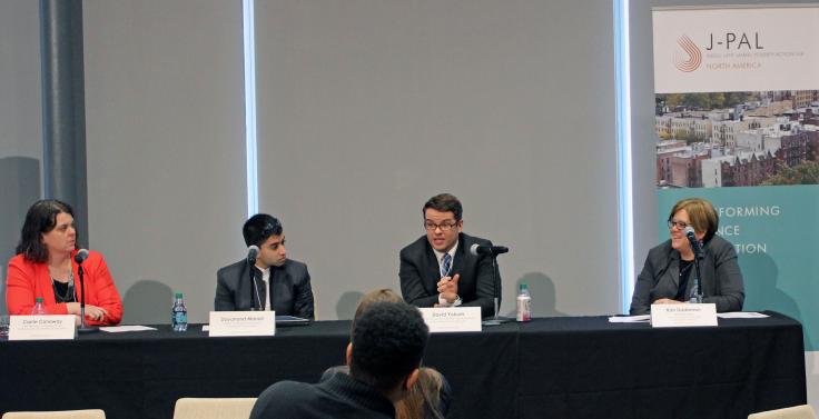 Image: Panelists discuss their experiences bridging communications barriers between research and policy. 