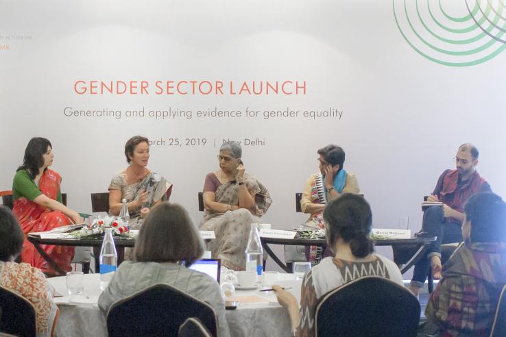 Panelists sit at a table at the Gender Sector launch in New Delhi.