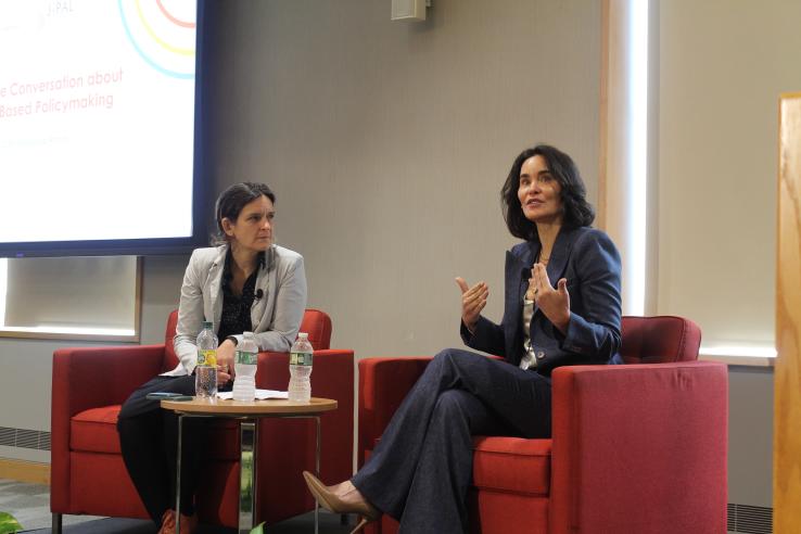 From left to right: Esther Duflo and Laura Arnold in conversation